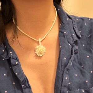 Carved Floral Pendant Necklace in Cream